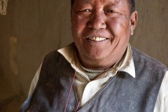 Portrait of worker at a Tibetan Barley Mill